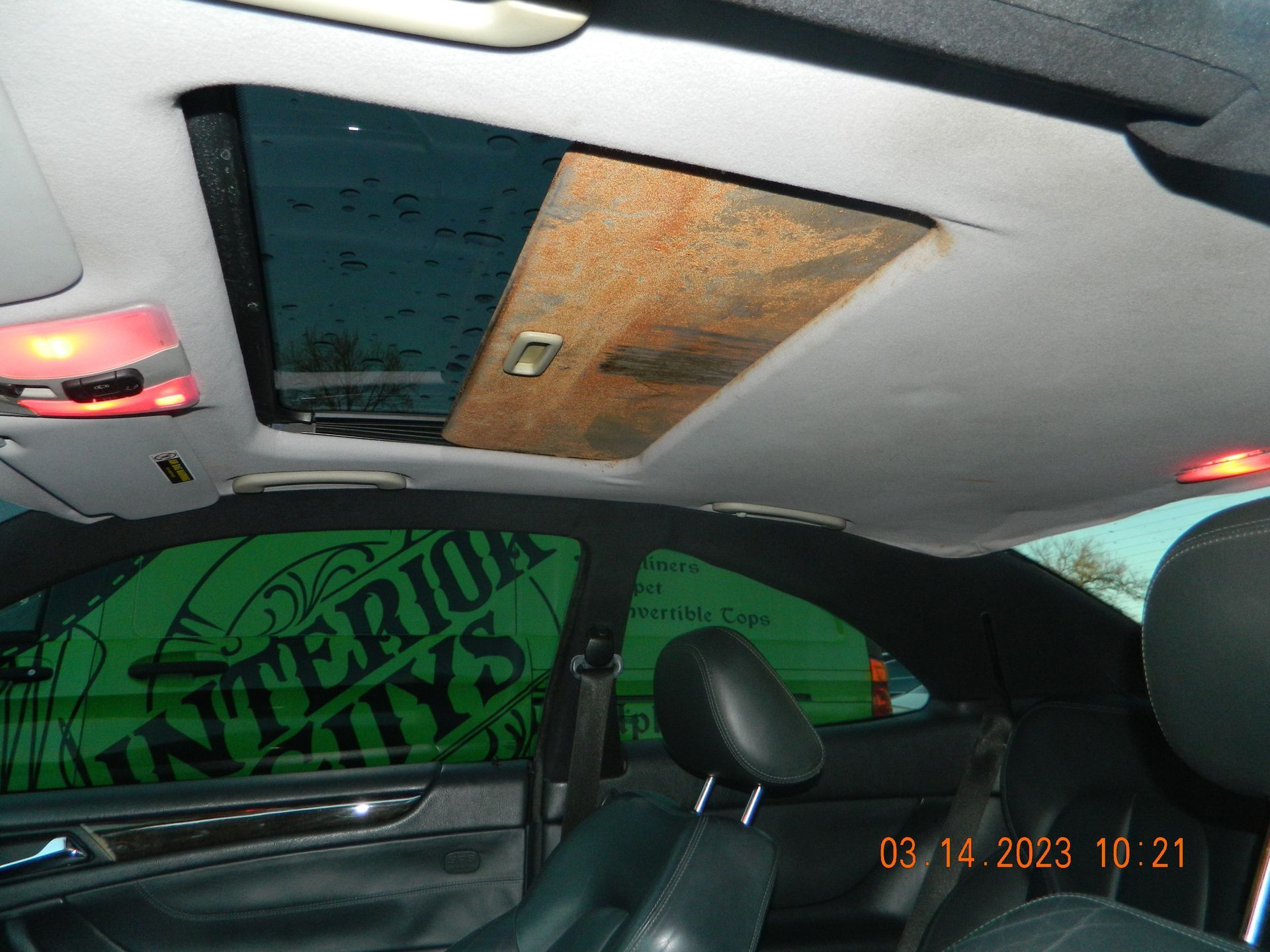 Car interior with headliners