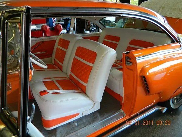 Cream and Orange Car Seat