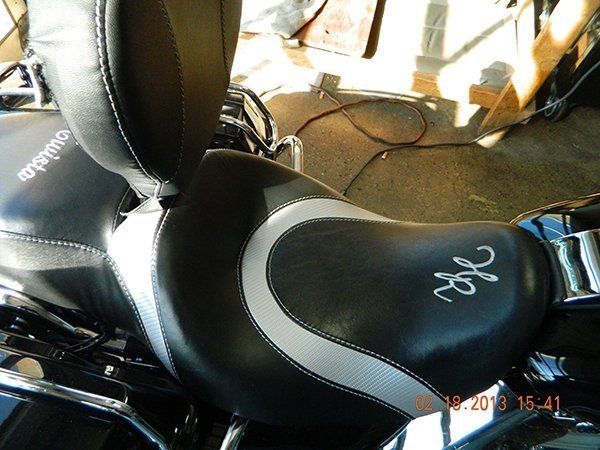Custom black leather with silver lines motorcycle seat