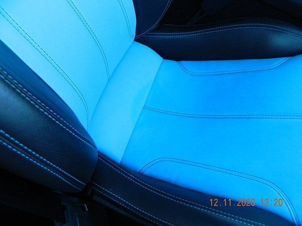 Blue and light blue passenger seat