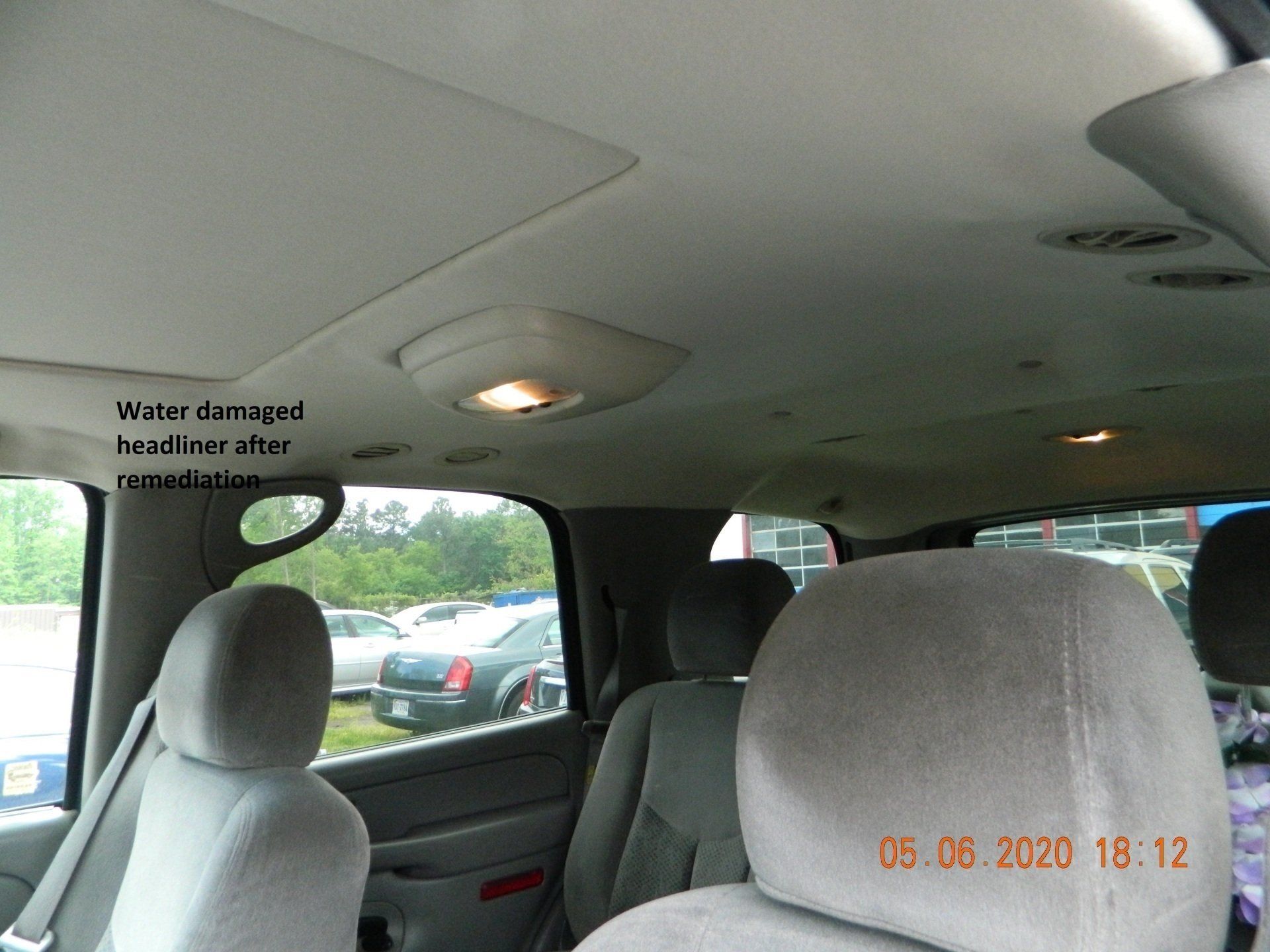 Water damaged headliner after remediation
