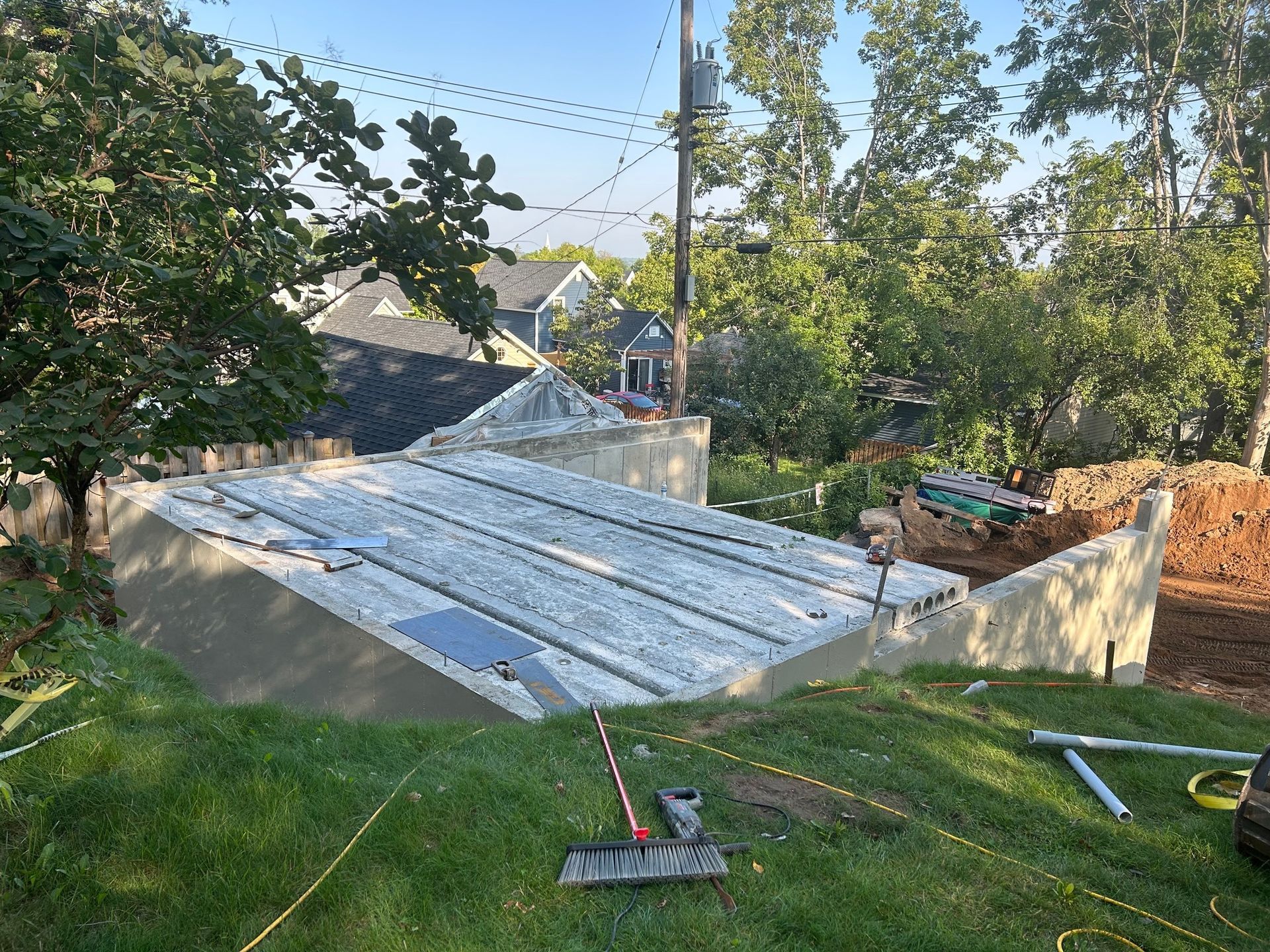 A shed is being built in the backyard of a house.