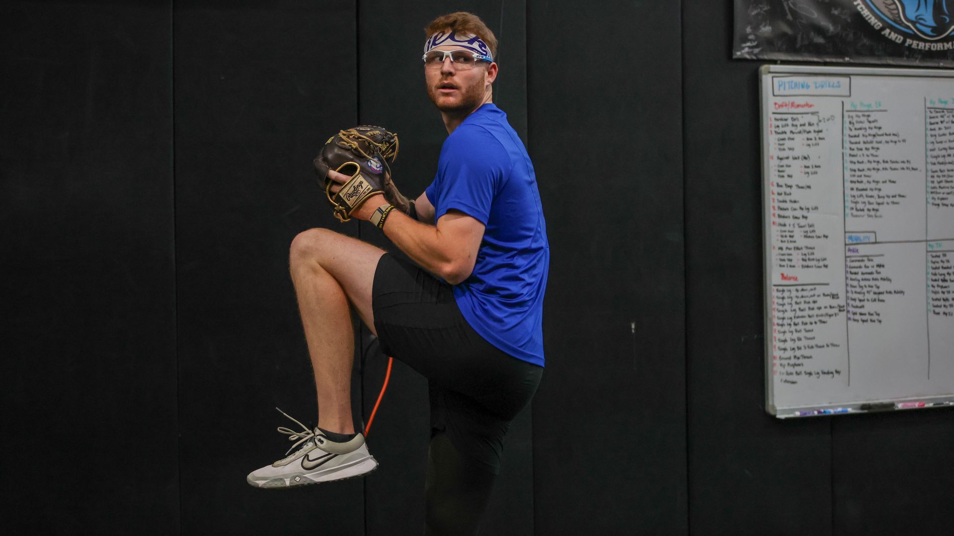 A baseball pitcher with the number 14 on his jersey