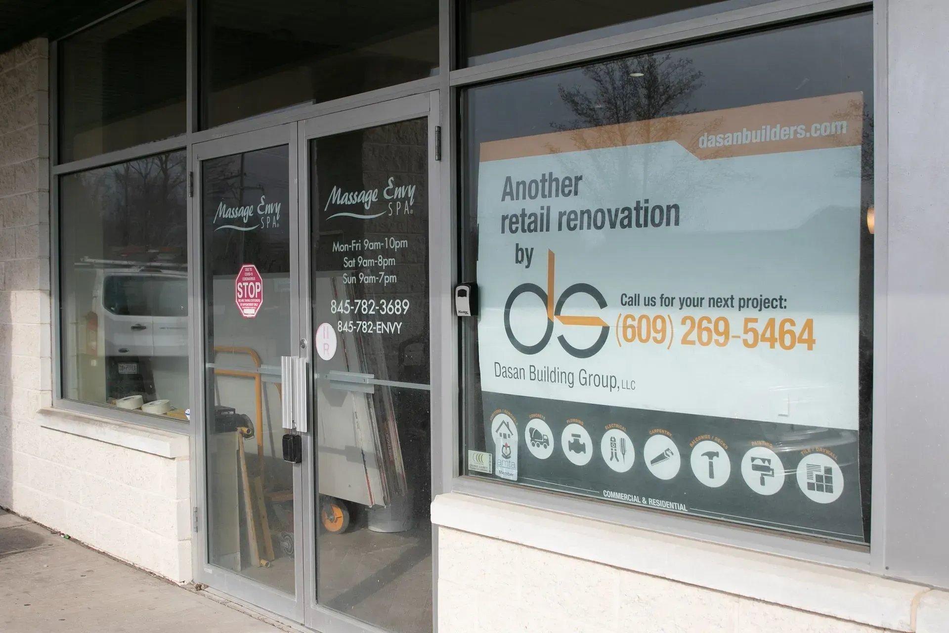 Exterior of a business with a sign: 