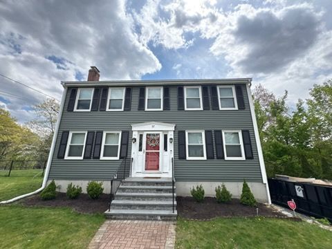 home-siding-replacement-certainteed-milford-ma-front-entry-red-door