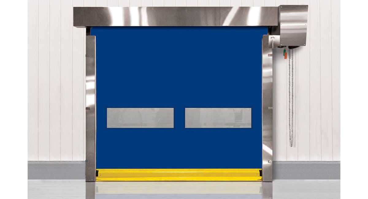 Blue, high-speed door with stainless steel frame, yellow bottom, in a white and gray industrial setting.