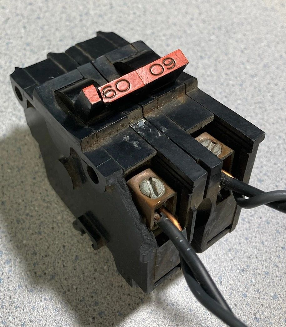A close up of a breaker with the number 60 on it