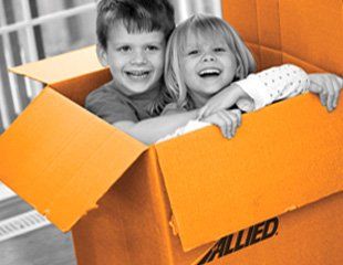 Children playing with the box