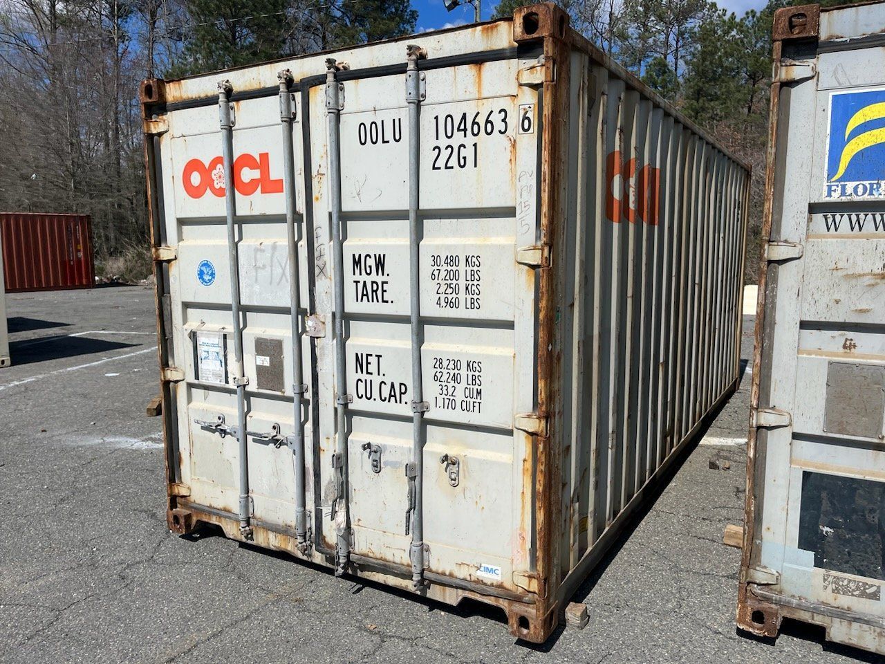 A shipping container with the number 2261 on it