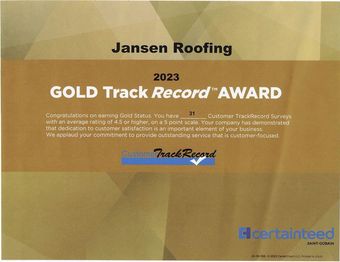 A jansen roofing gold track record award from 2023