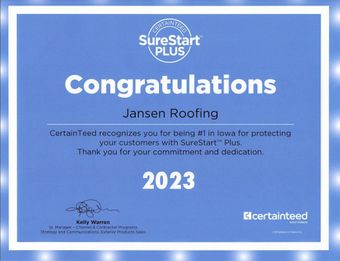 A blue certificate that says `` congratulations jansen roofing ''