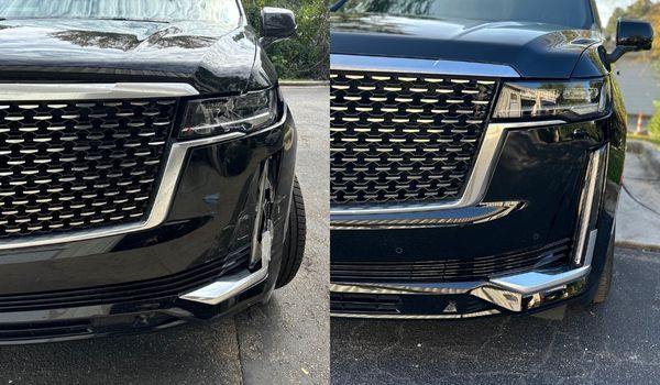 Two black SUVs, front views. One shows damaged front. Other is undamaged.
