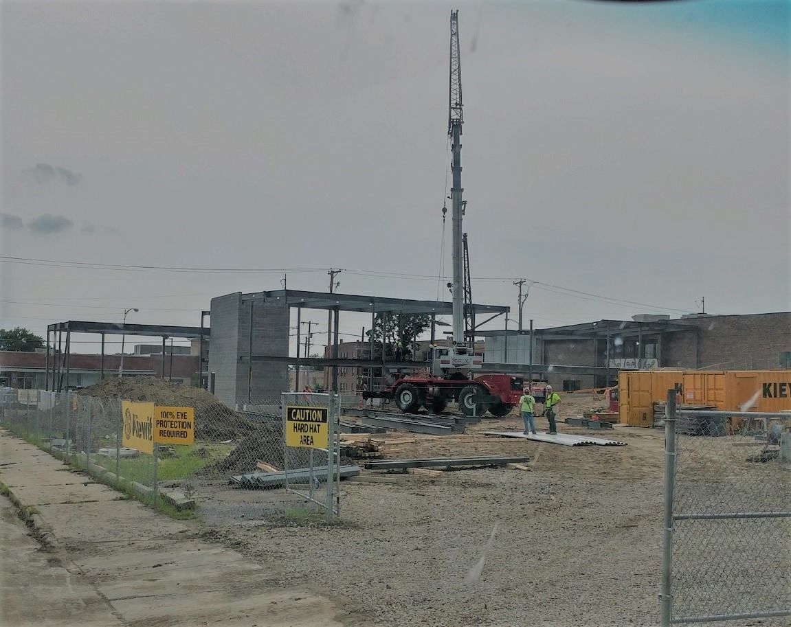 A construction site with a sign that says kurt on it