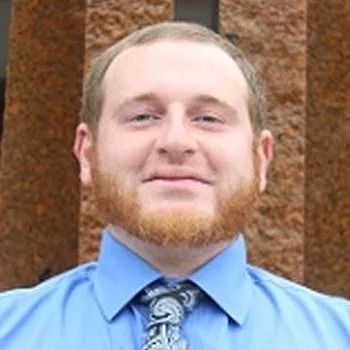 Photo of {{Team Member Name}}