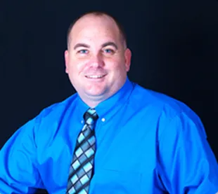 Photo of {{Team Member Name}}