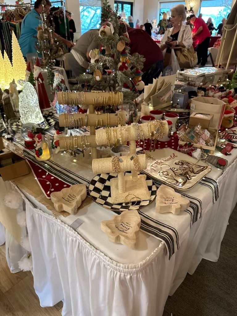 A table with a lot of christmas decorations on it.