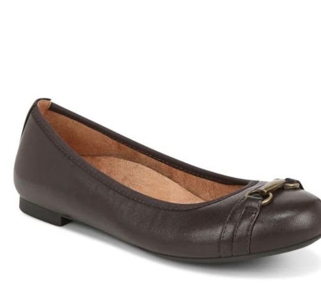 Brown flat shoe with a gold buckle