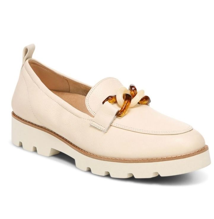 White shoe with a knot on it