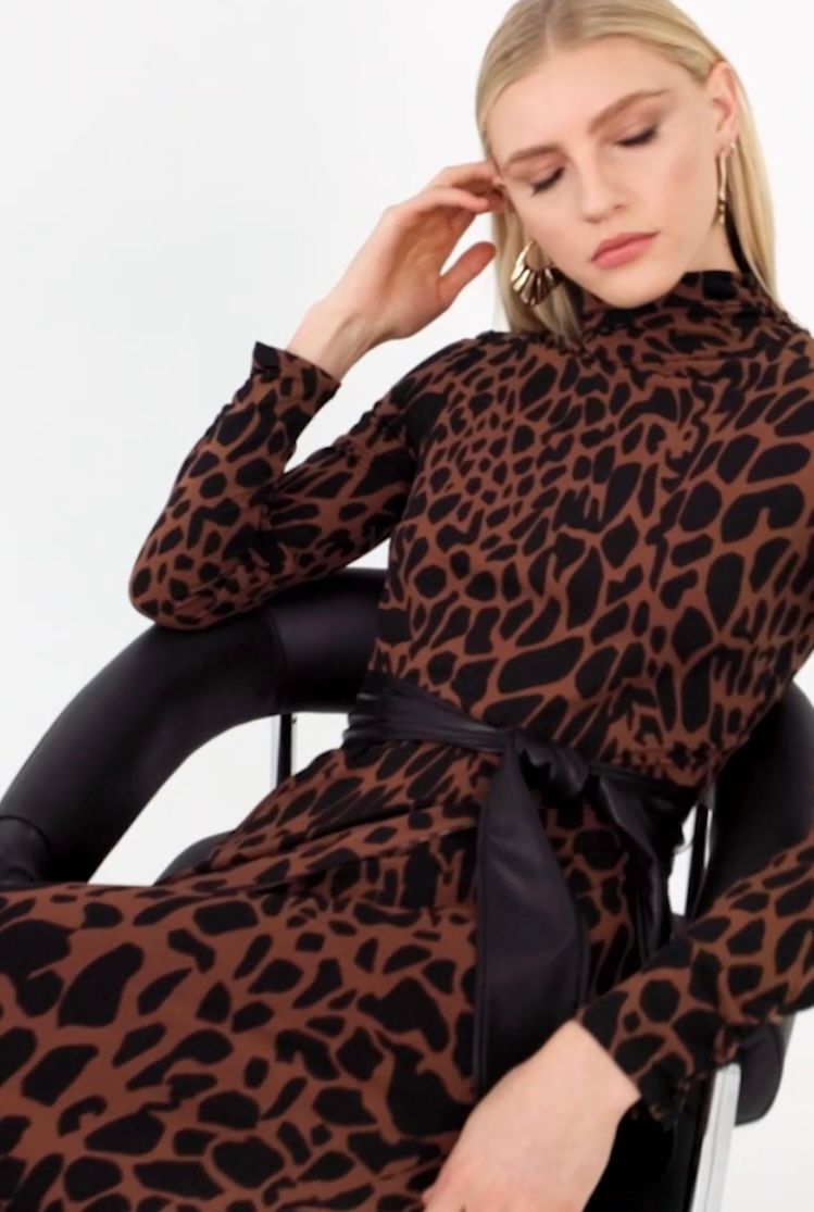 Woman sitting in a chair