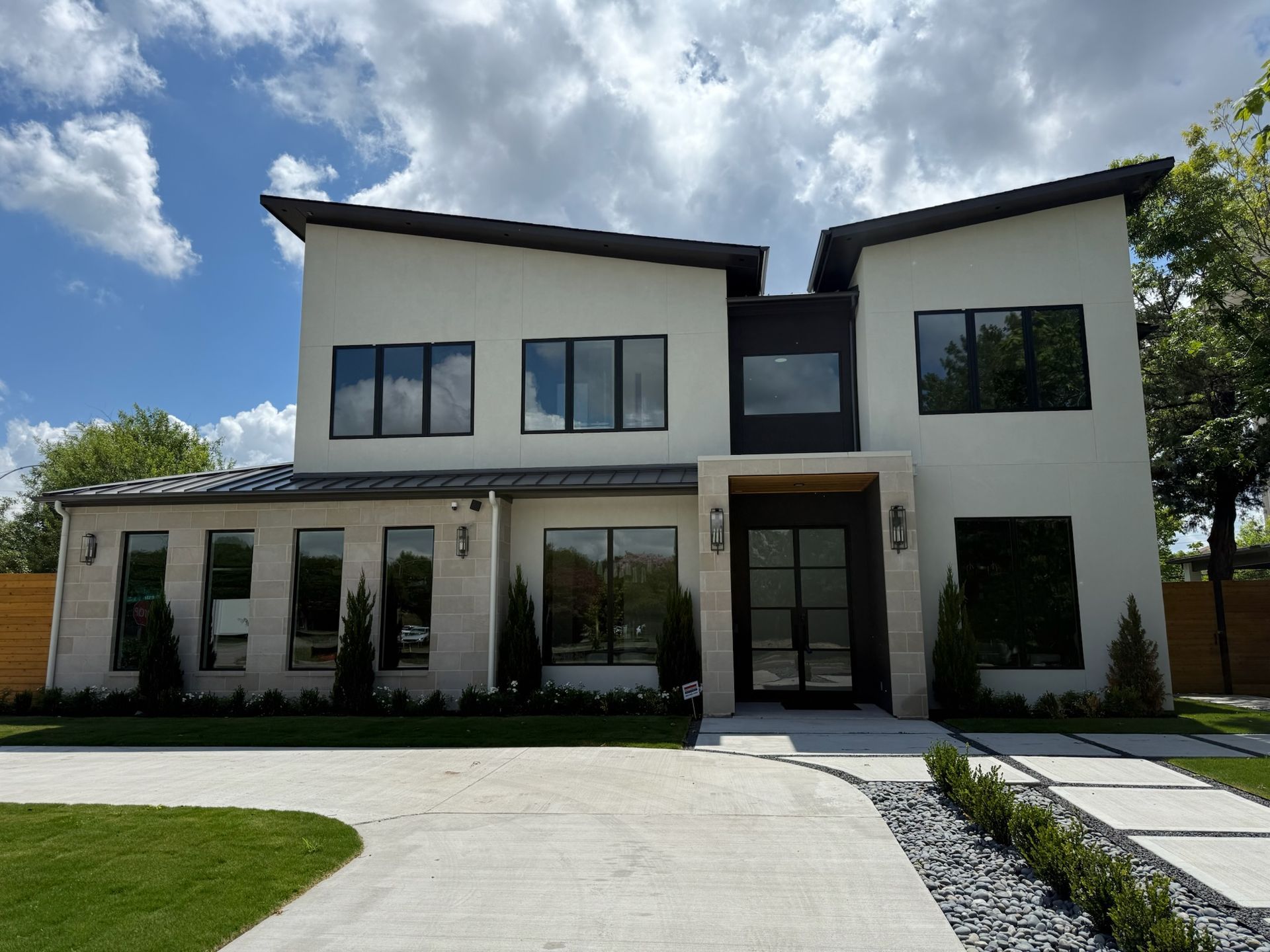 A large white house with a lot of windows