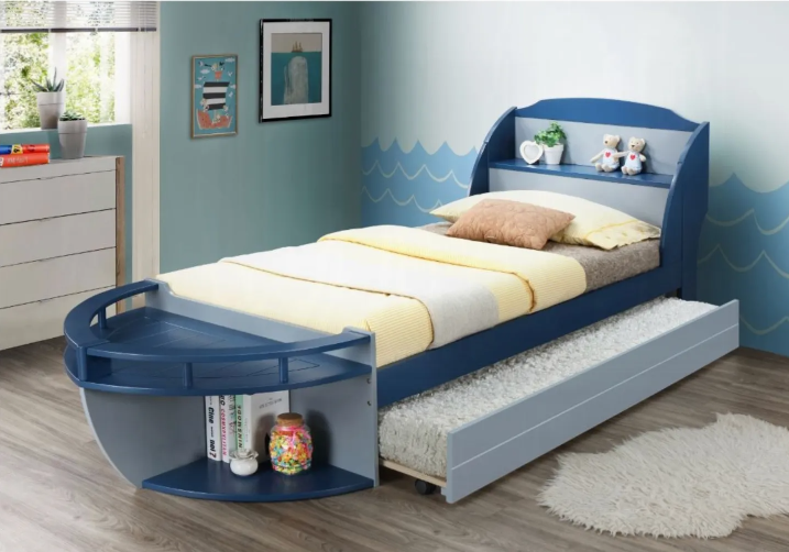 A bedroom with a bed in the shape of a boat