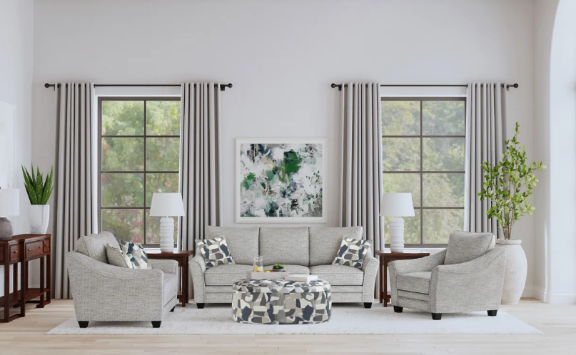 A living room with a couch , two chairs , and a coffee table.