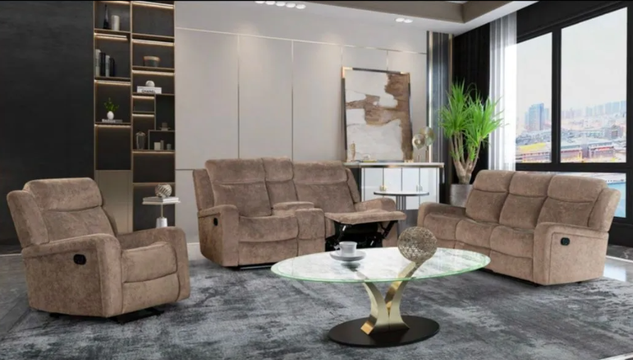 A living room with a couch , two chairs , and a coffee table.