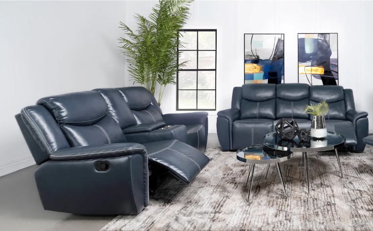 A living room with a couch , chair , and coffee table.