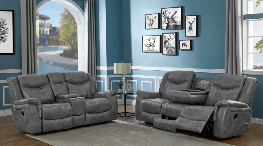 A living room with a couch and a recliner.