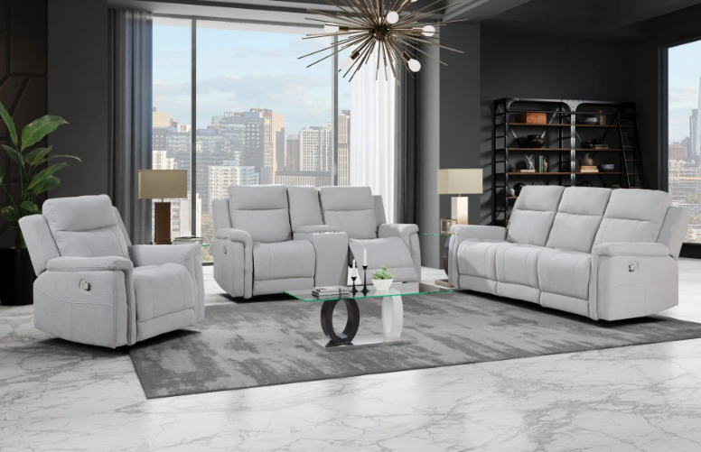 A living room with a couch , chair , and coffee table.