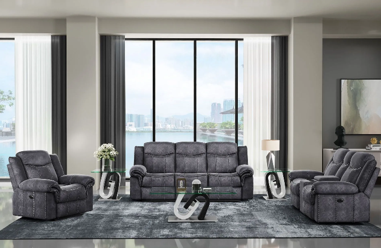 A living room with a couch , two chairs , and a coffee table.