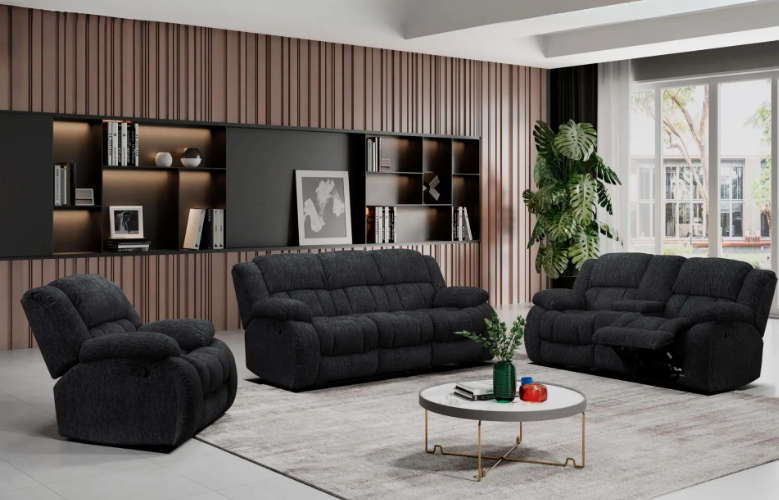 A living room with a couch , chair , and coffee table.