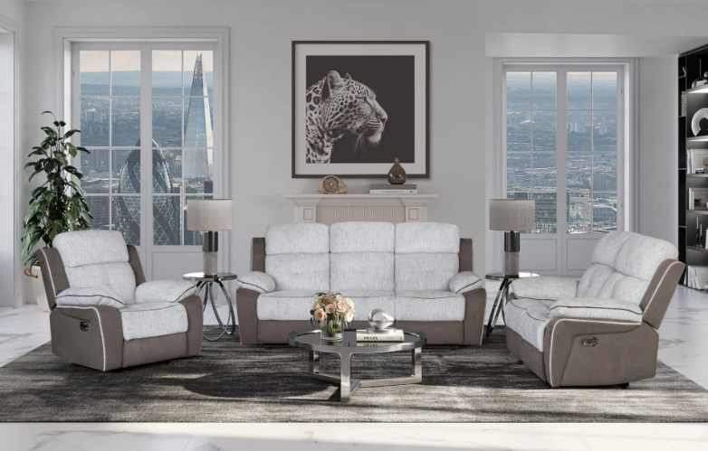 A living room with a couch , two chairs and a coffee table.