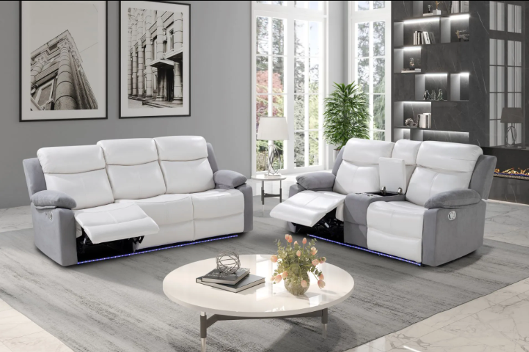 A living room with two reclining couches and a coffee table.