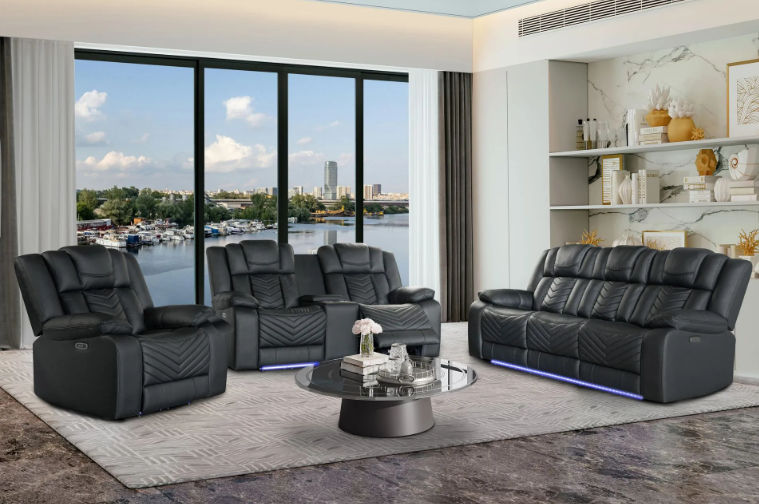 A living room with a couch , chair , and coffee table.