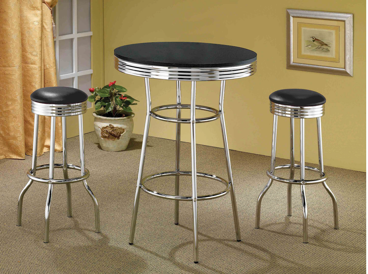 A table and two bar stools in a living room