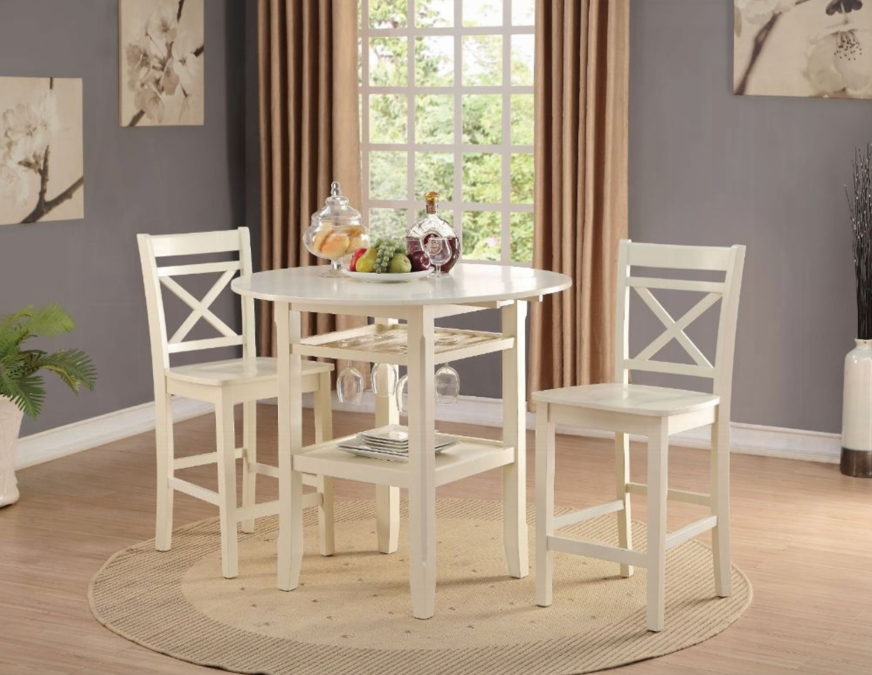 A white table and chairs in a living room