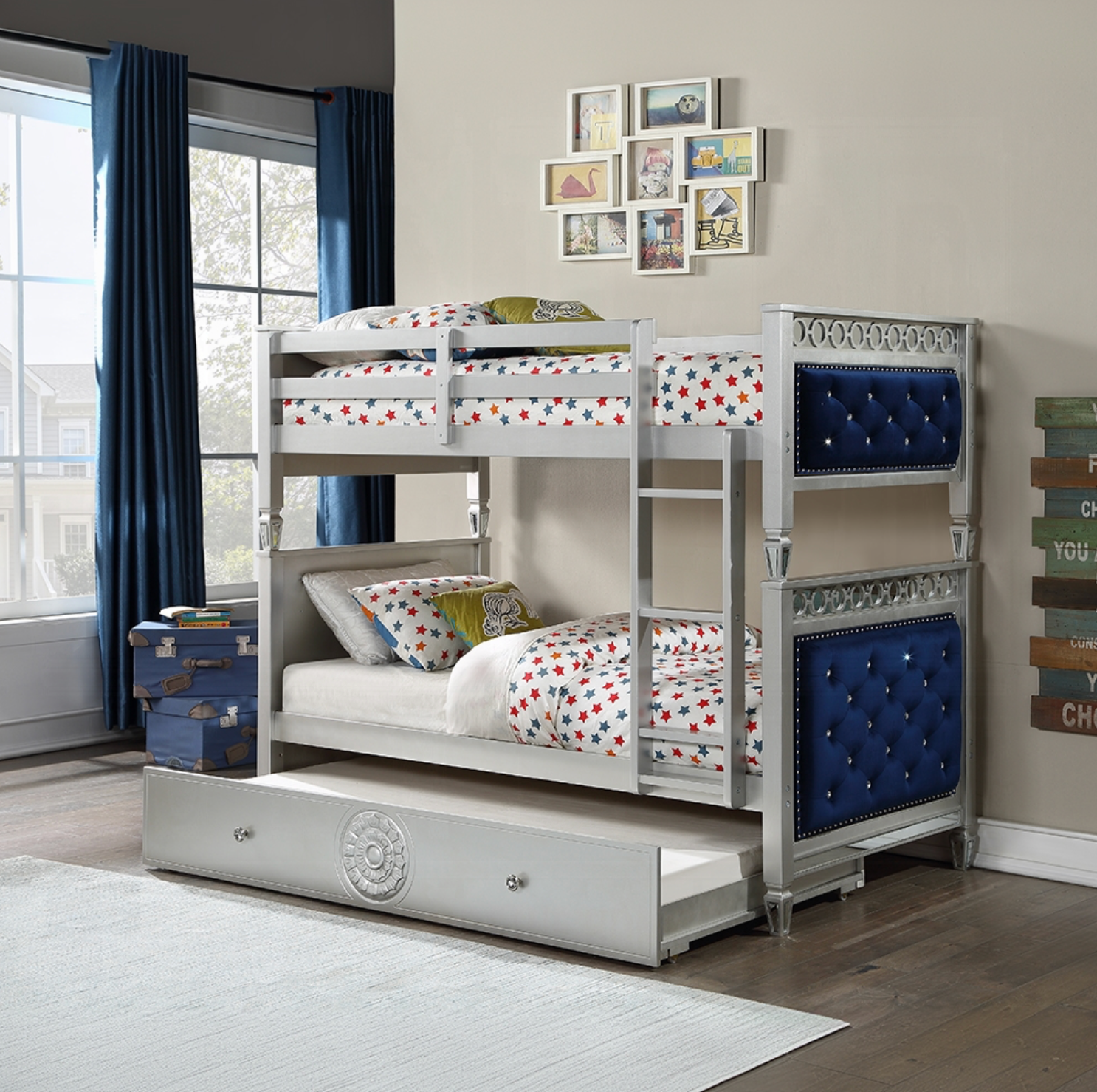 A bunk bed with a drawer underneath it in a bedroom