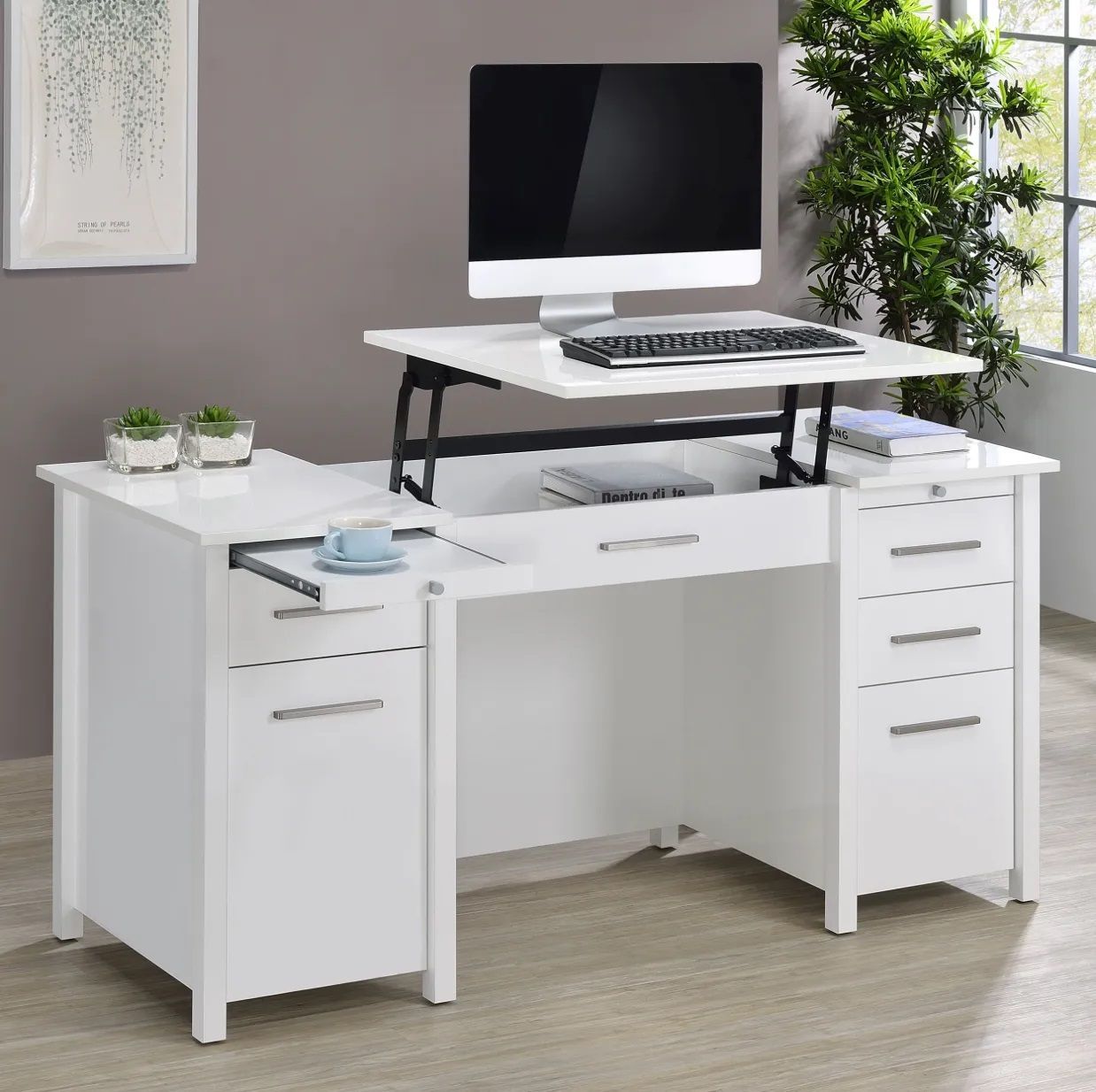 A white desk with a computer on top of it.