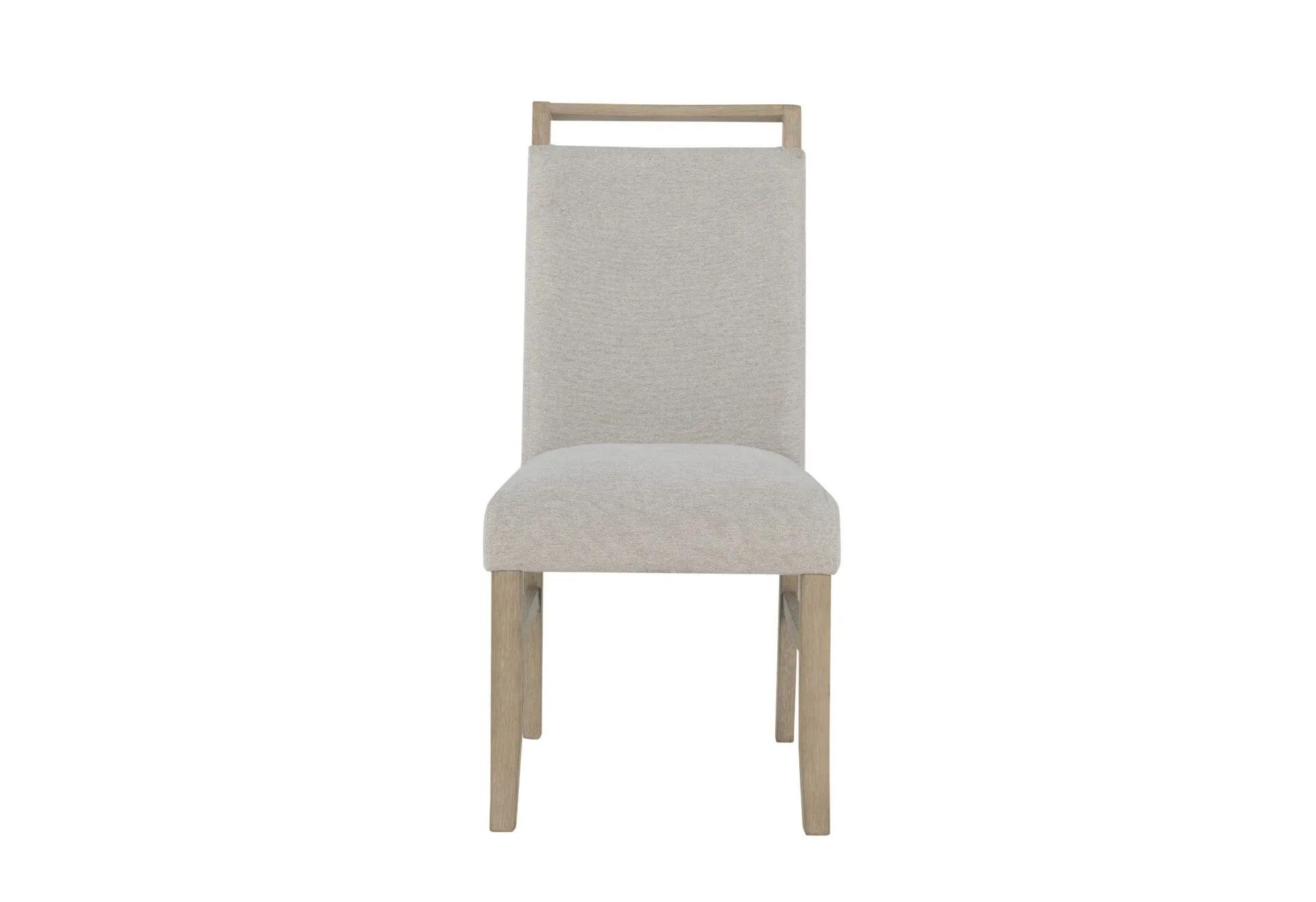 A white dining chair with a wooden frame on a white background.