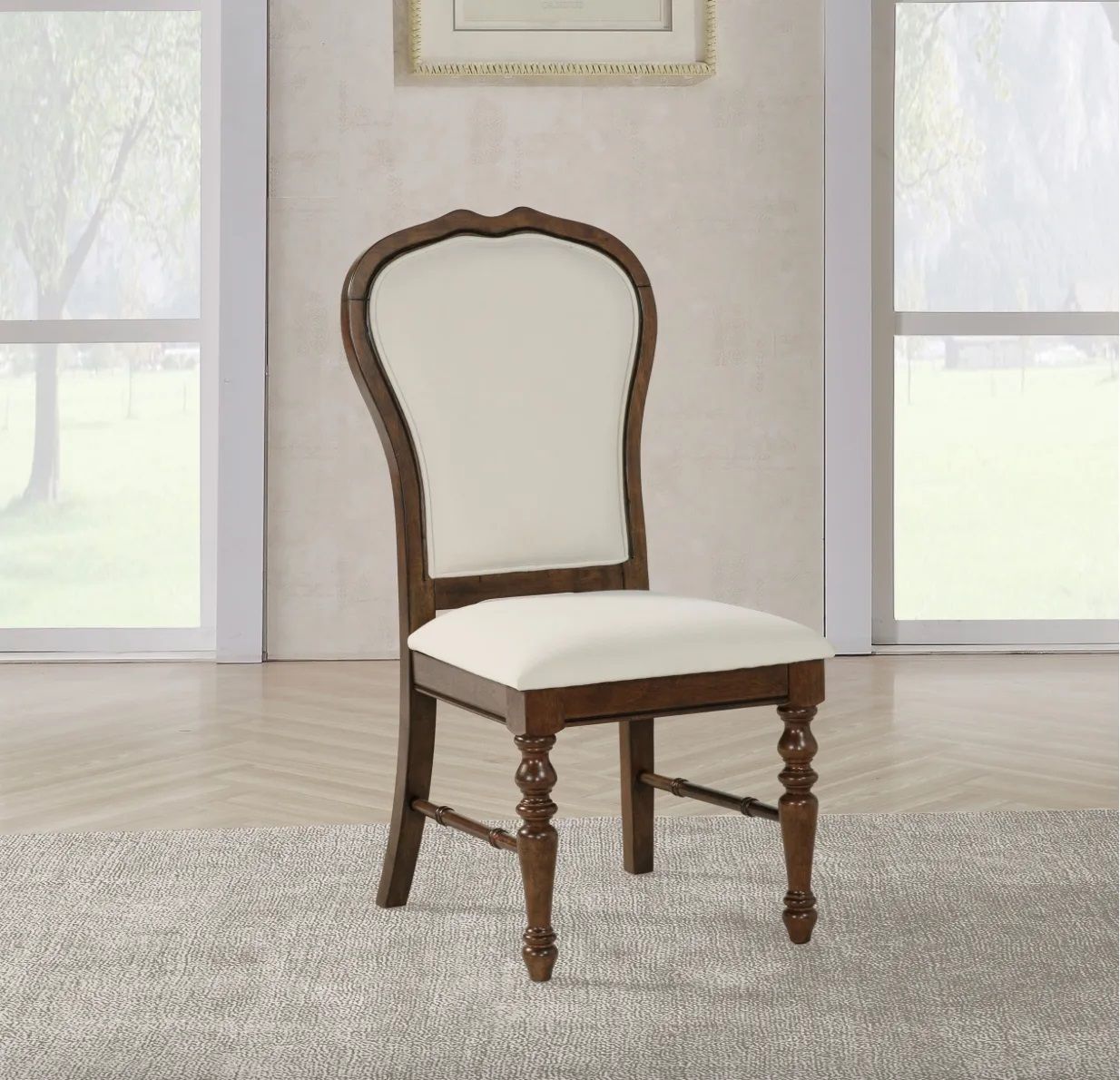 A wooden chair with a white cushion is in a living room