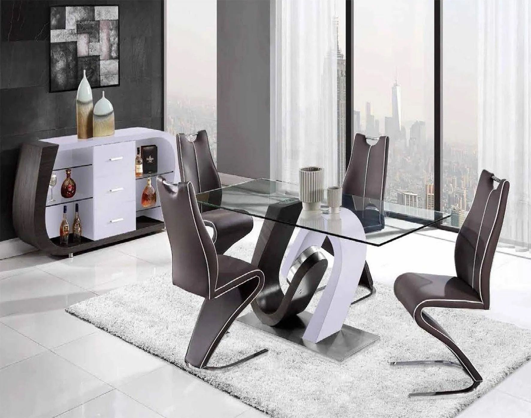 A dining room with a glass table and chairs