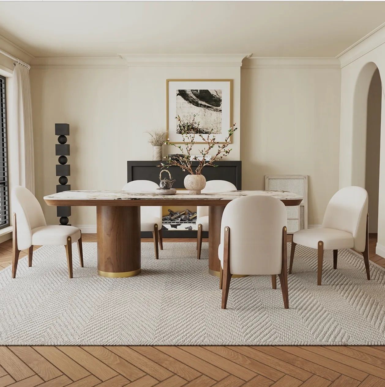 A dining room with a table and chairs and a rug