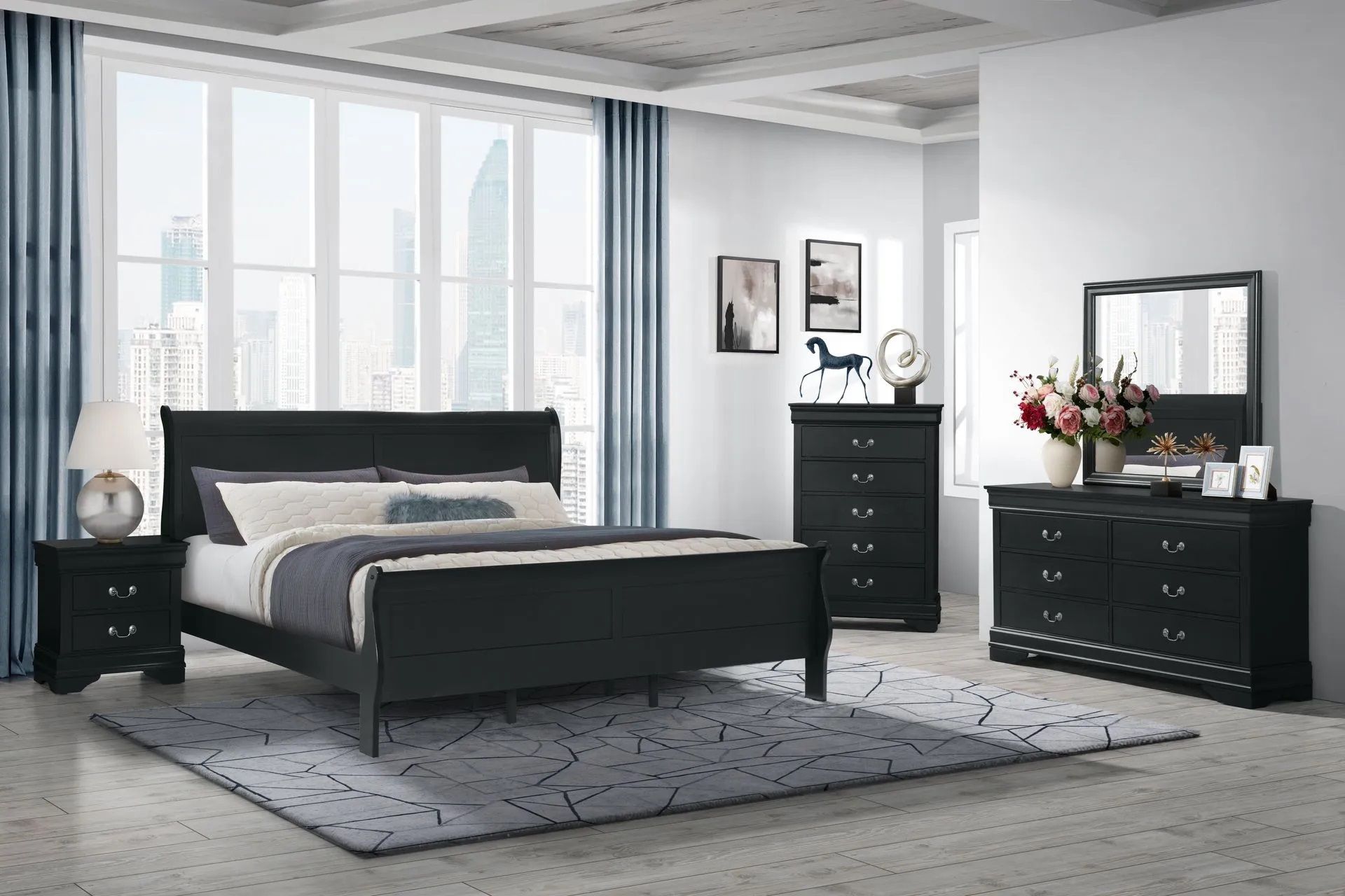A bedroom with a bed , dresser , nightstand and mirror.