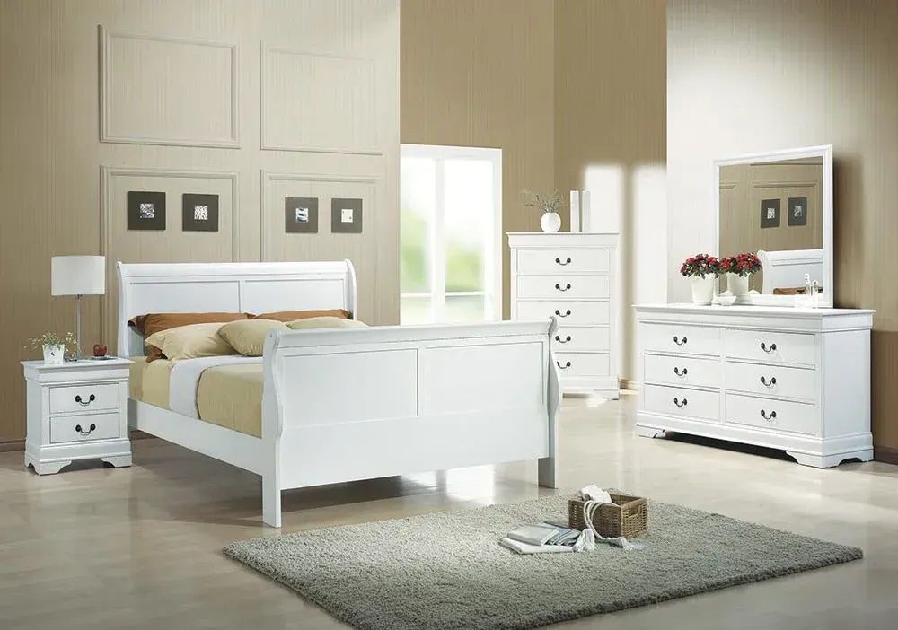 A bedroom with a white sleigh bed dresser and nightstand
