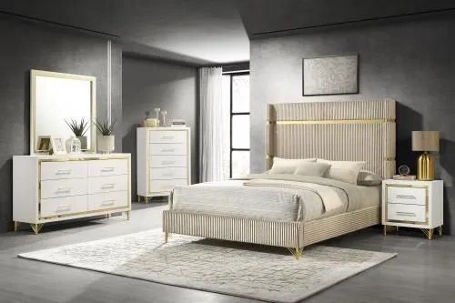 A bedroom with a bed , dresser , nightstand , mirror and rug.