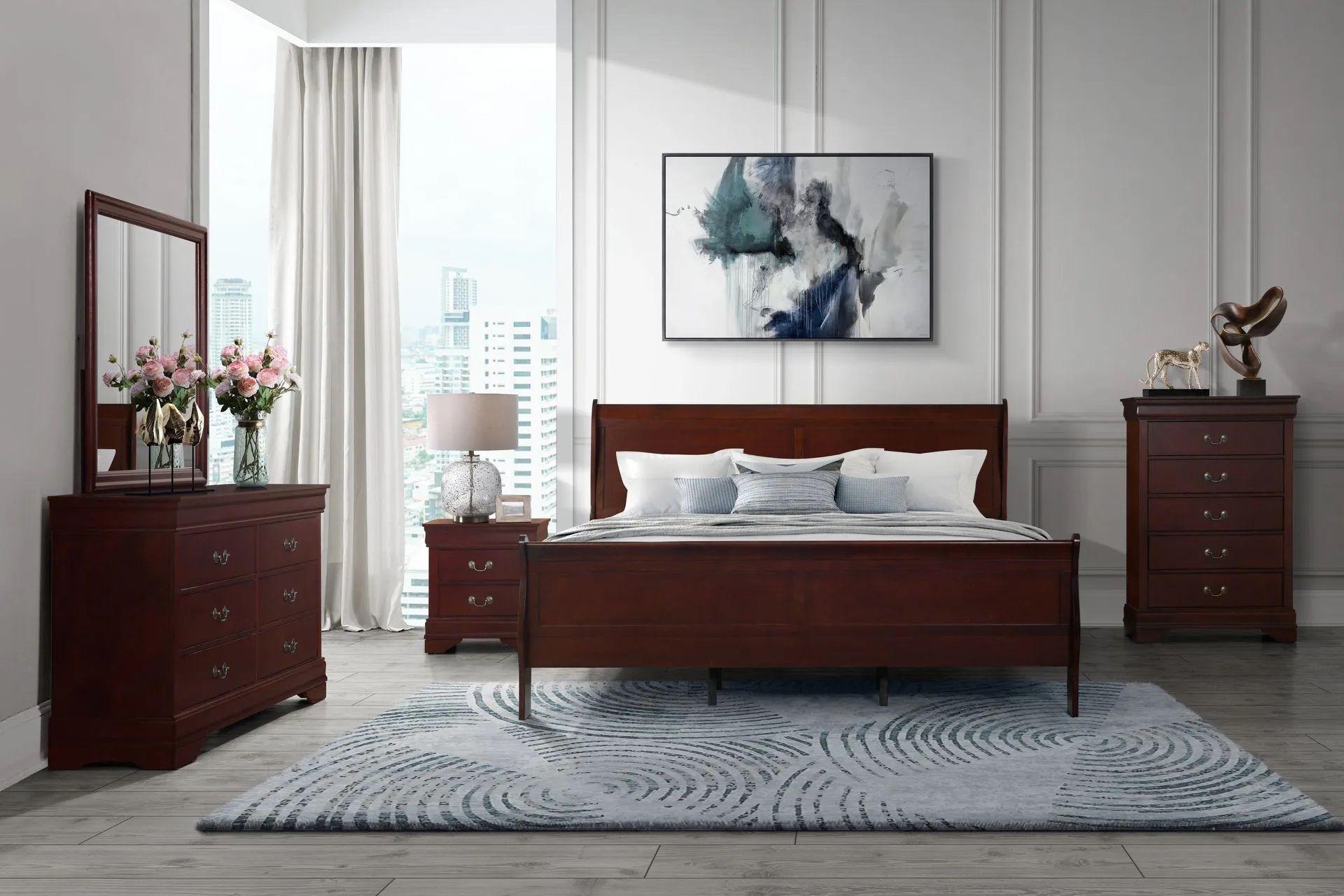 A bedroom with a bed , dresser , nightstand , mirror and rug.