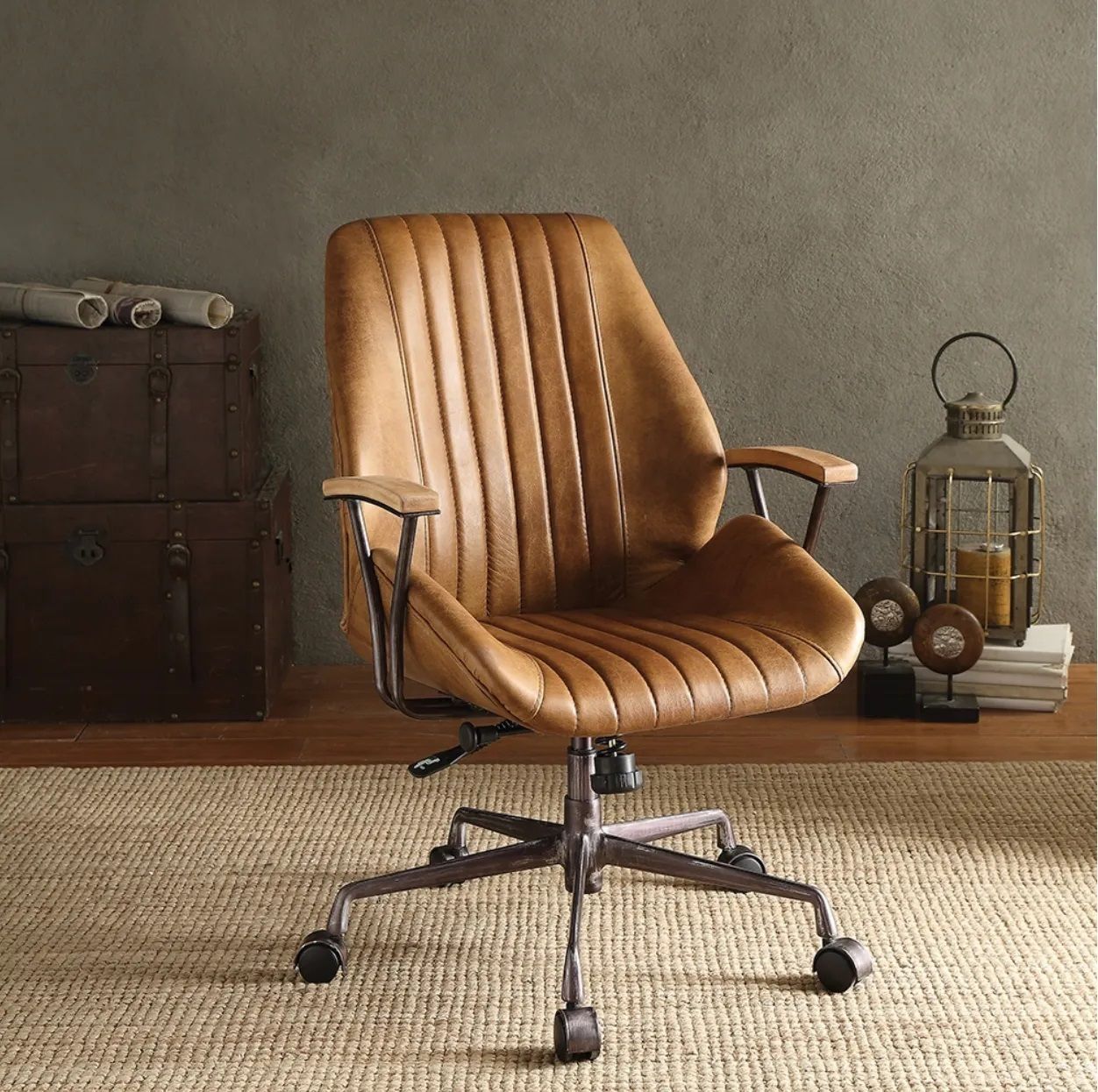 A brown leather office chair is sitting on a rug in a room.