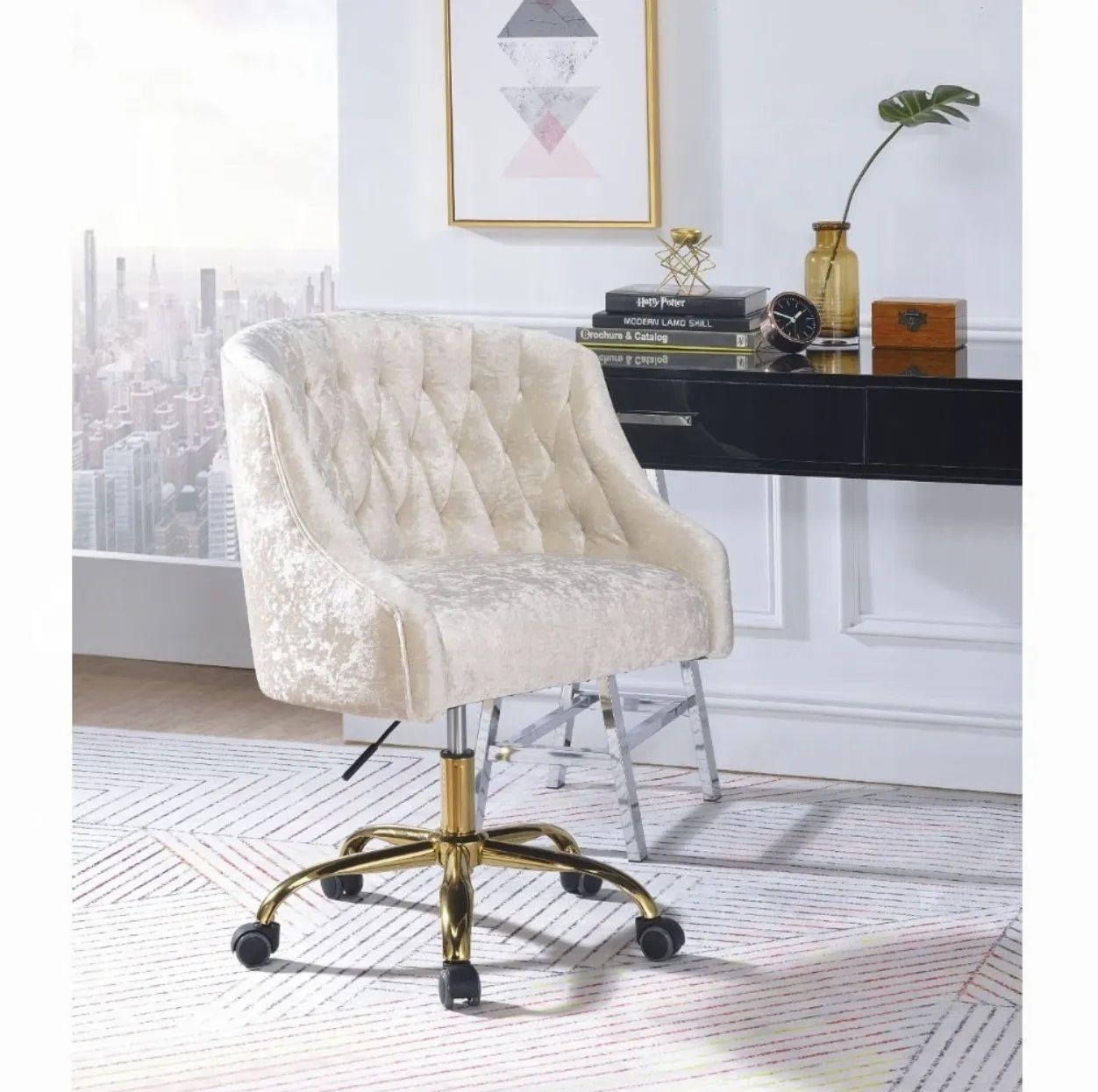 A white chair is sitting in front of a desk in a room.