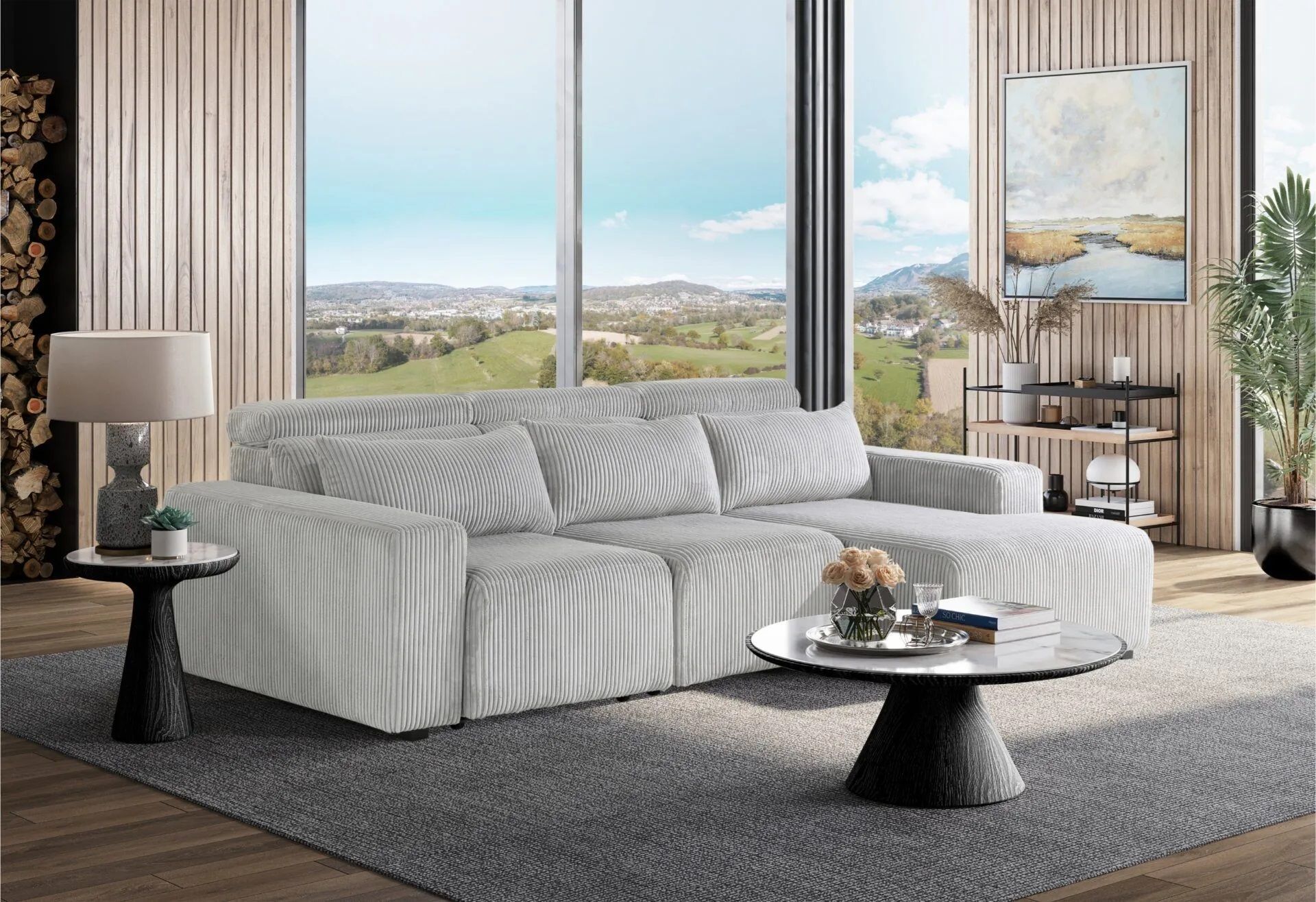 A living room with a white couch and a coffee table.